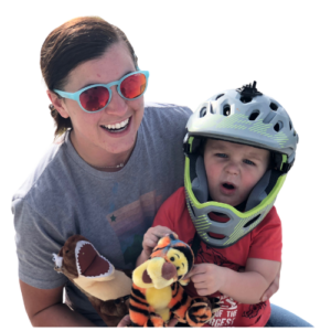 Mother with toddler in bike helmet